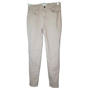 Neutral tan / pink jeans